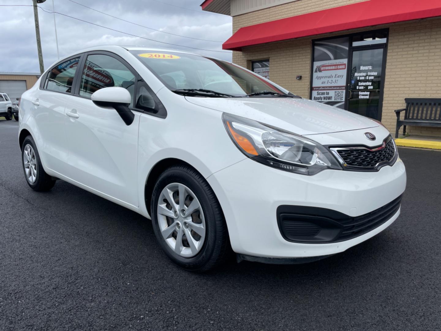 2014 White Kia Rio (KNADN4A35E6) with an 4-Cyl, 1.6 Liter engine, Automatic, 6-Spd transmission, located at 8008 Warden Rd, Sherwood, AR, 72120, (501) 801-6100, 34.830078, -92.186684 - Photo#1